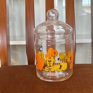Glass Jar with lid and yellow and orange tigers and lions